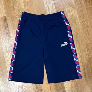 Puma Kids Dark Blue Shorts with Red and White Trim.  New without tags.